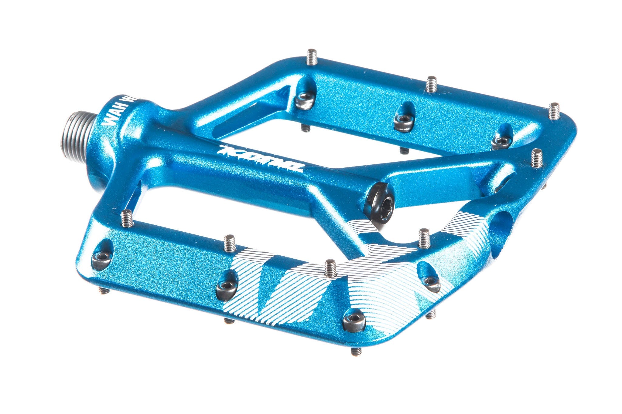 Cyclist using flat pedals for mountain biking on rugged terrain