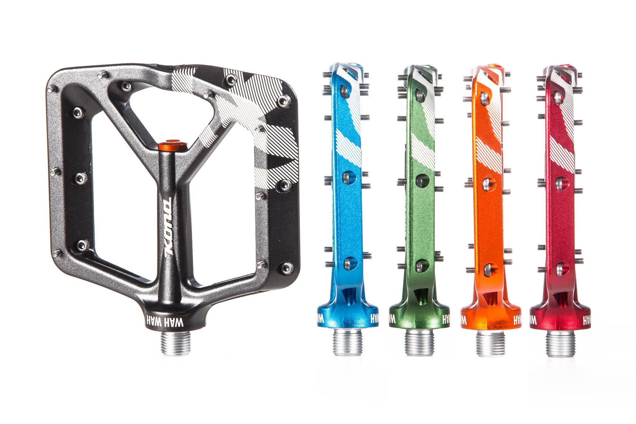 Wah Wah II aluminum flat mountain bike pedals mounted on a bike trail