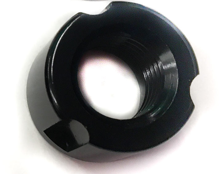 Bike axle fixing nut installed on bicycle frame, showing secure attachment