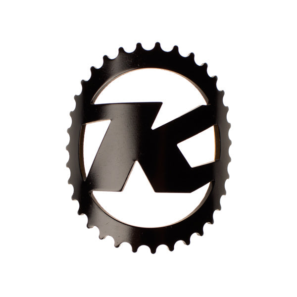 Close-up of TrailGear™ bike badge on a matte black headtube