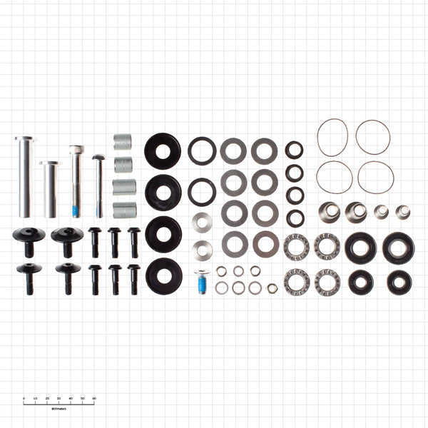 Coilair bushing and bolt kit displayed on a workbench, showcasing its components.
