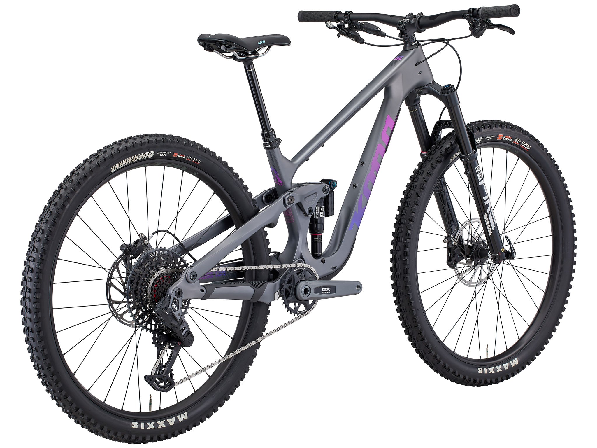 Rider enjoying the TrailMaster 134 Carbon Full Suspension Bike on a downhill path.