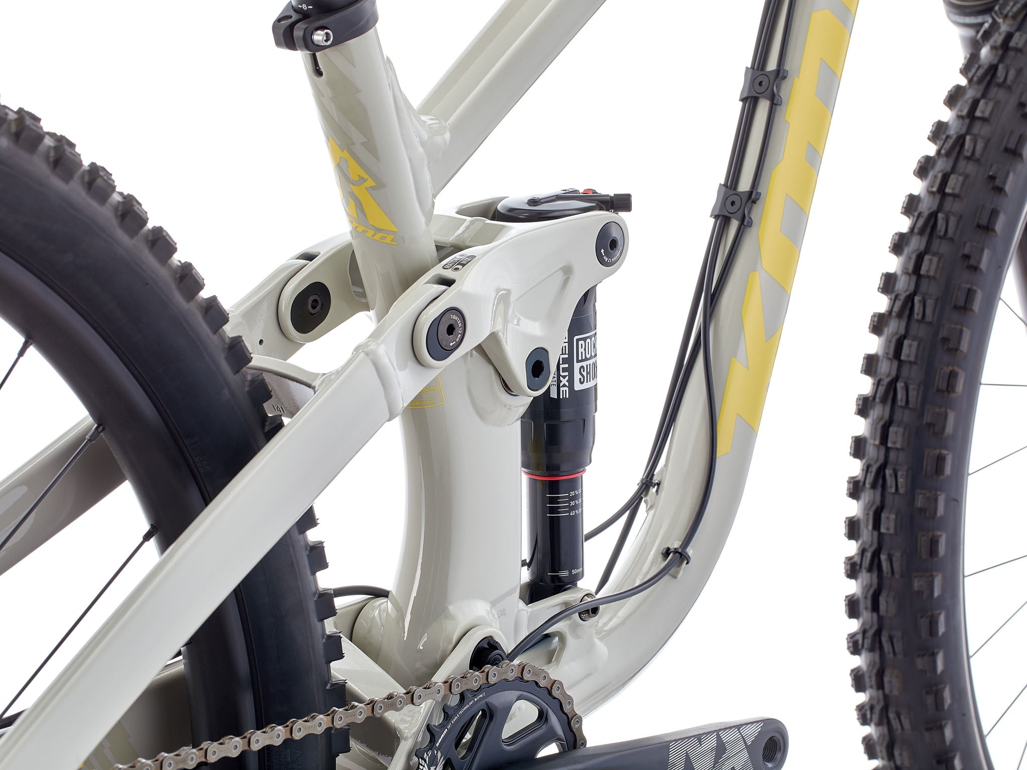 Side view of the Process 134 DL mullet mountain bike on a trail