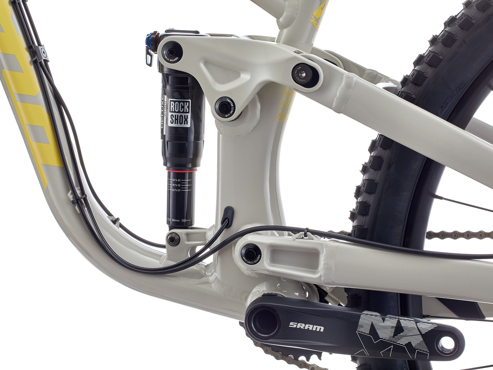 Close-up of the bikes full suspension system and rugged frame