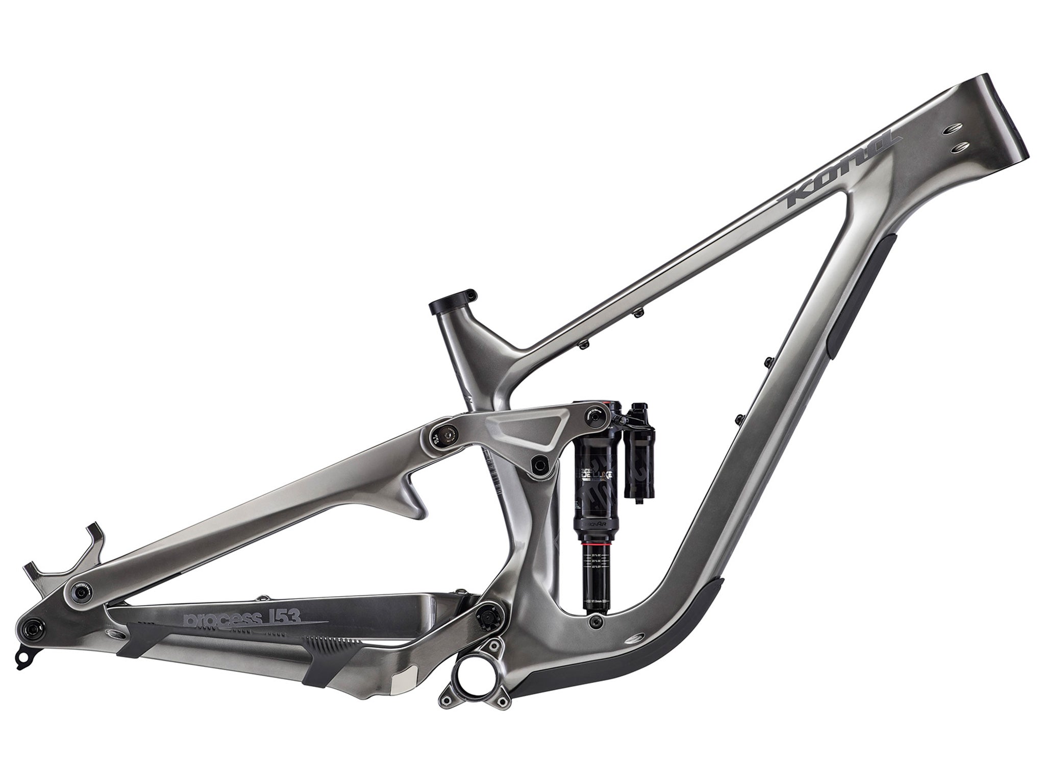 Enduro Elite Carbon Mountain Bike Frame in action on a rugged trail, highlighting its durability and performance.