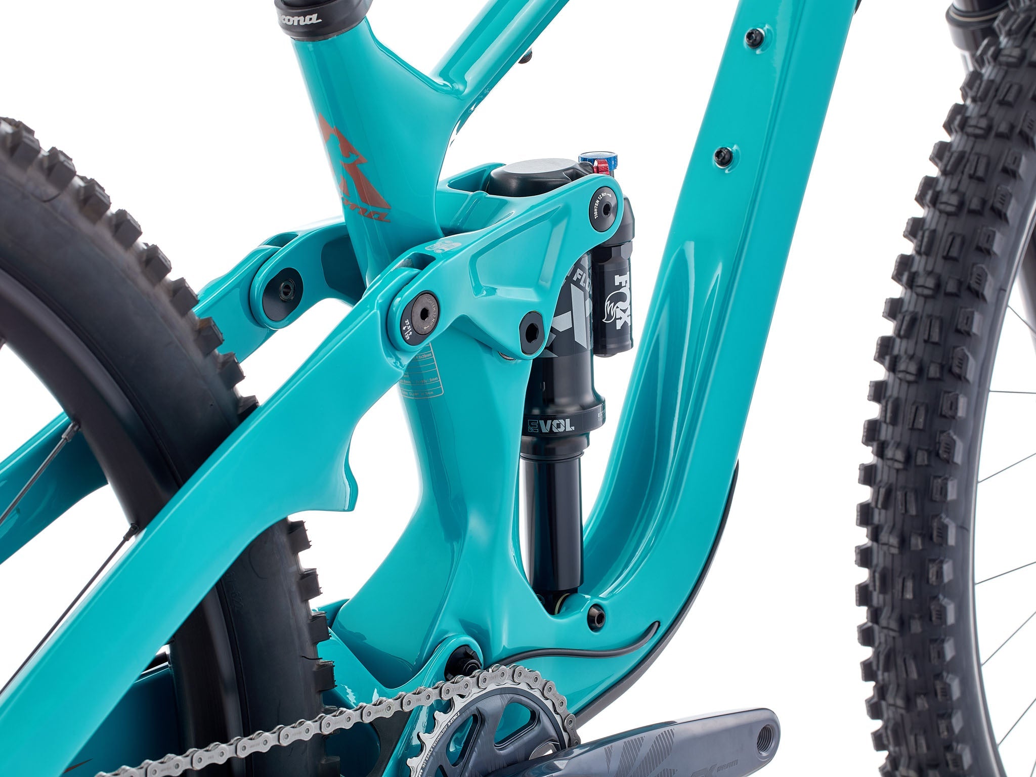 Carbon Fiber Trail Master 153 CR on a rocky trail, showcasing its high performance carbon fiber frame.
