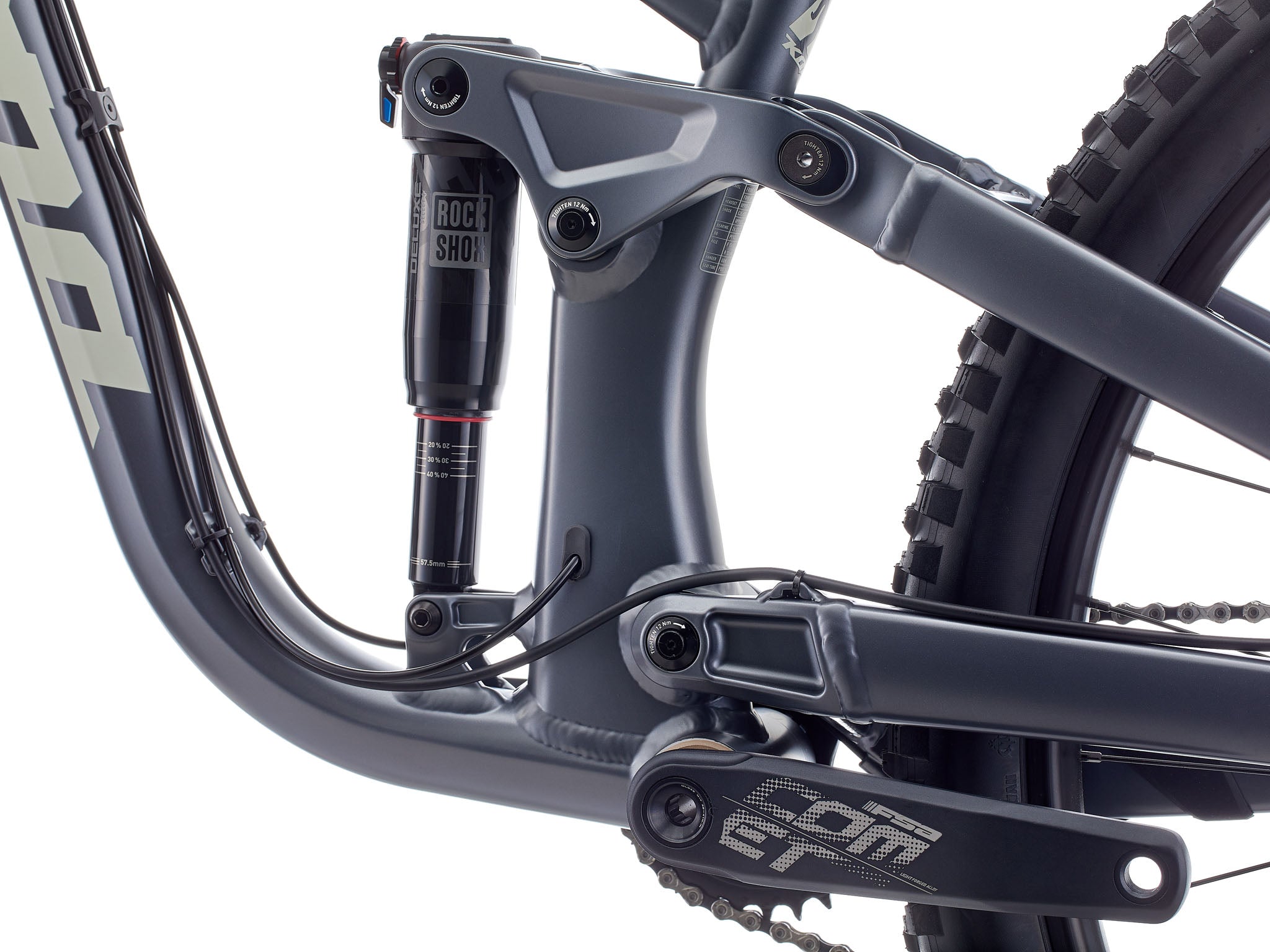 Close-up of the Adventure Buddy 153s flip-chip compatibility feature for versatile riding.