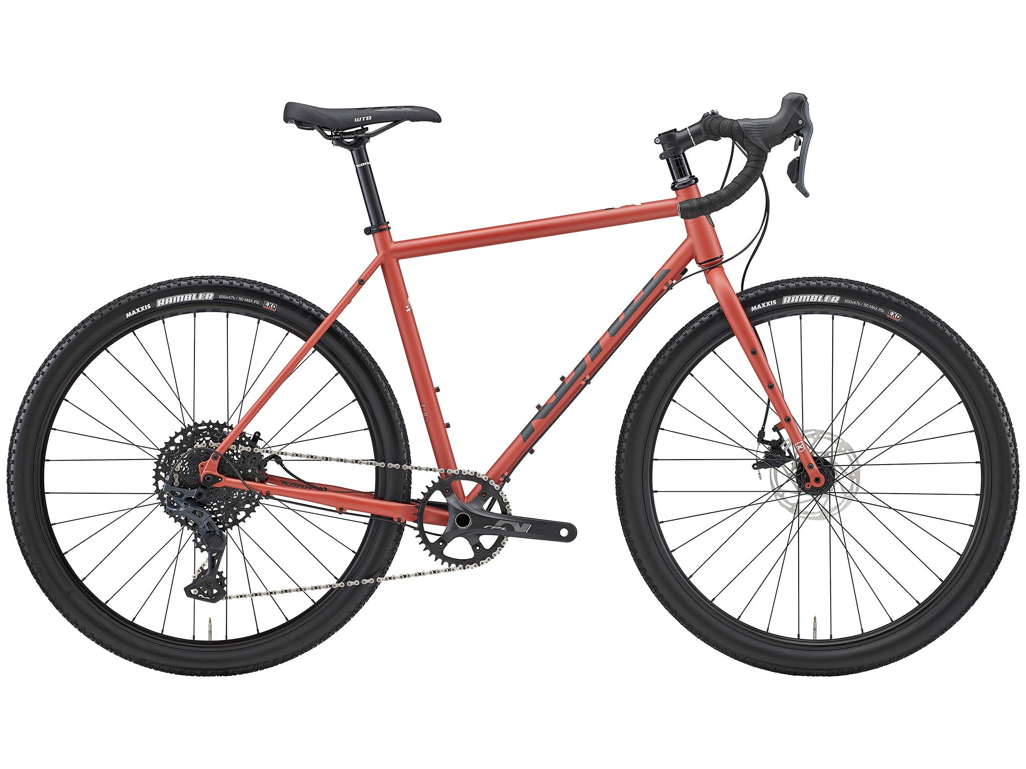 Side view of Rove steel gravel bike on urban street