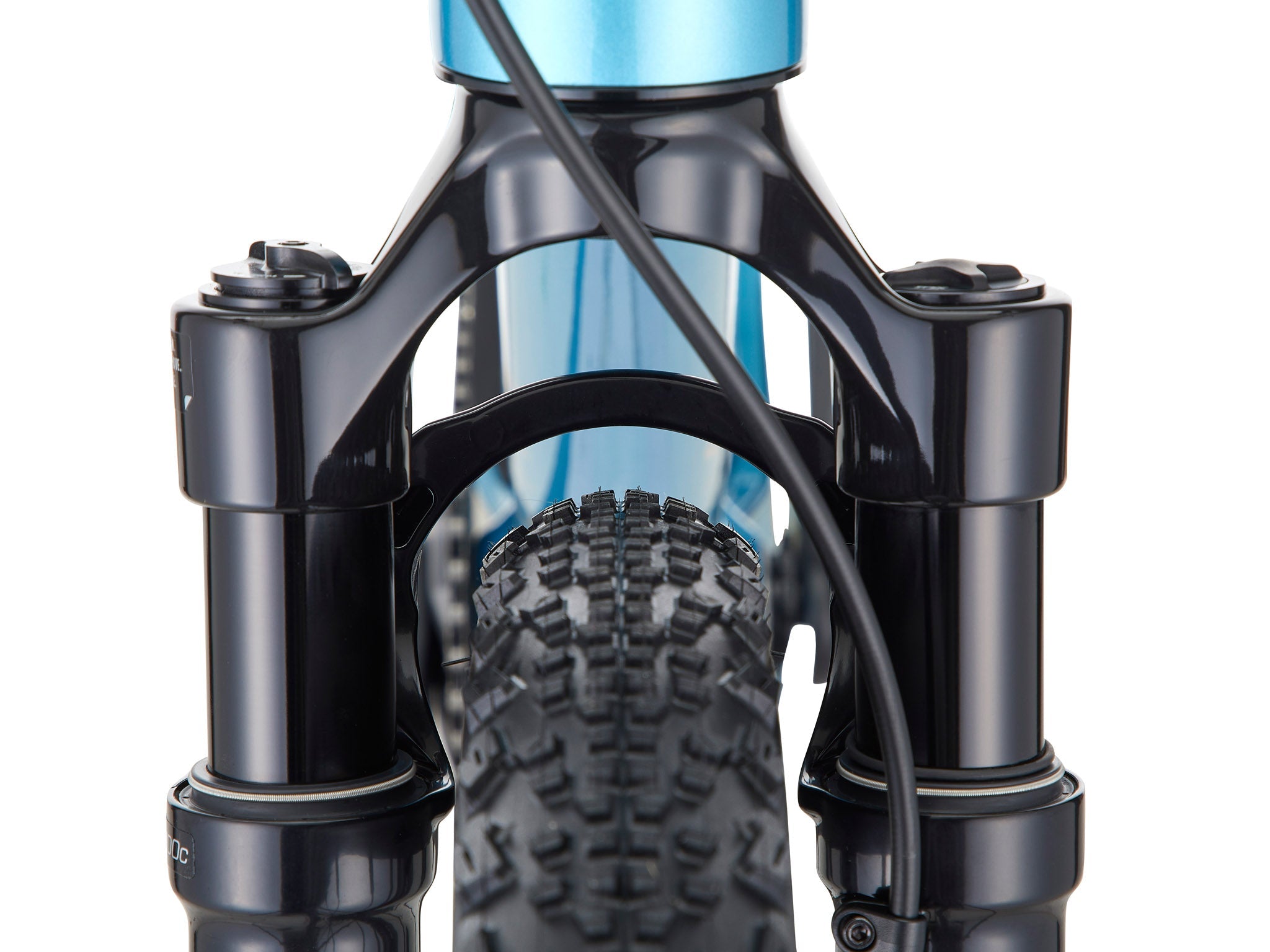 Ouroboros CR carbon mountain bike with fat tires on rugged trail