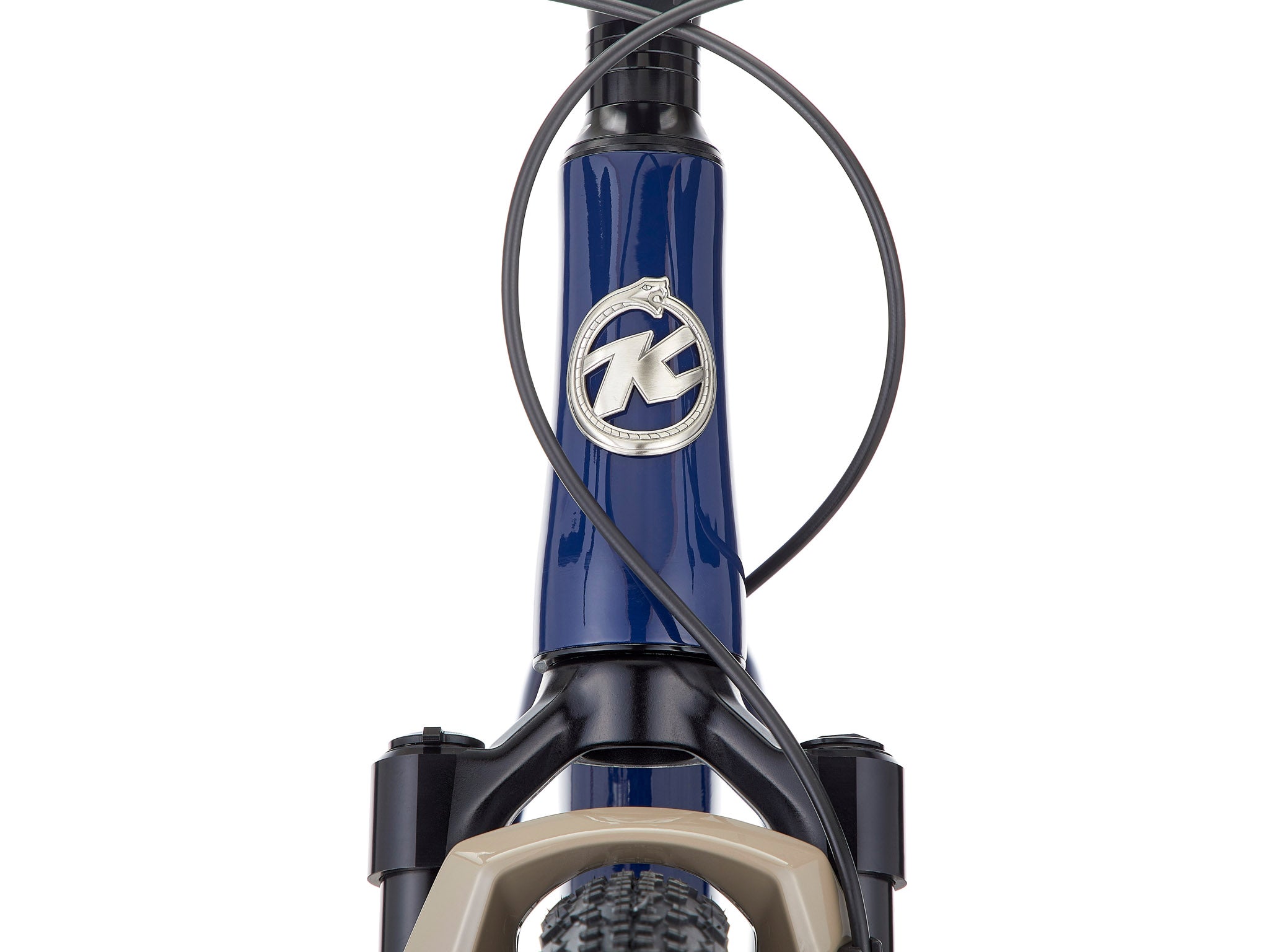Ouroboros Apex Carbon Mountain Bike in action on a forest trail, highlighting its suspension.