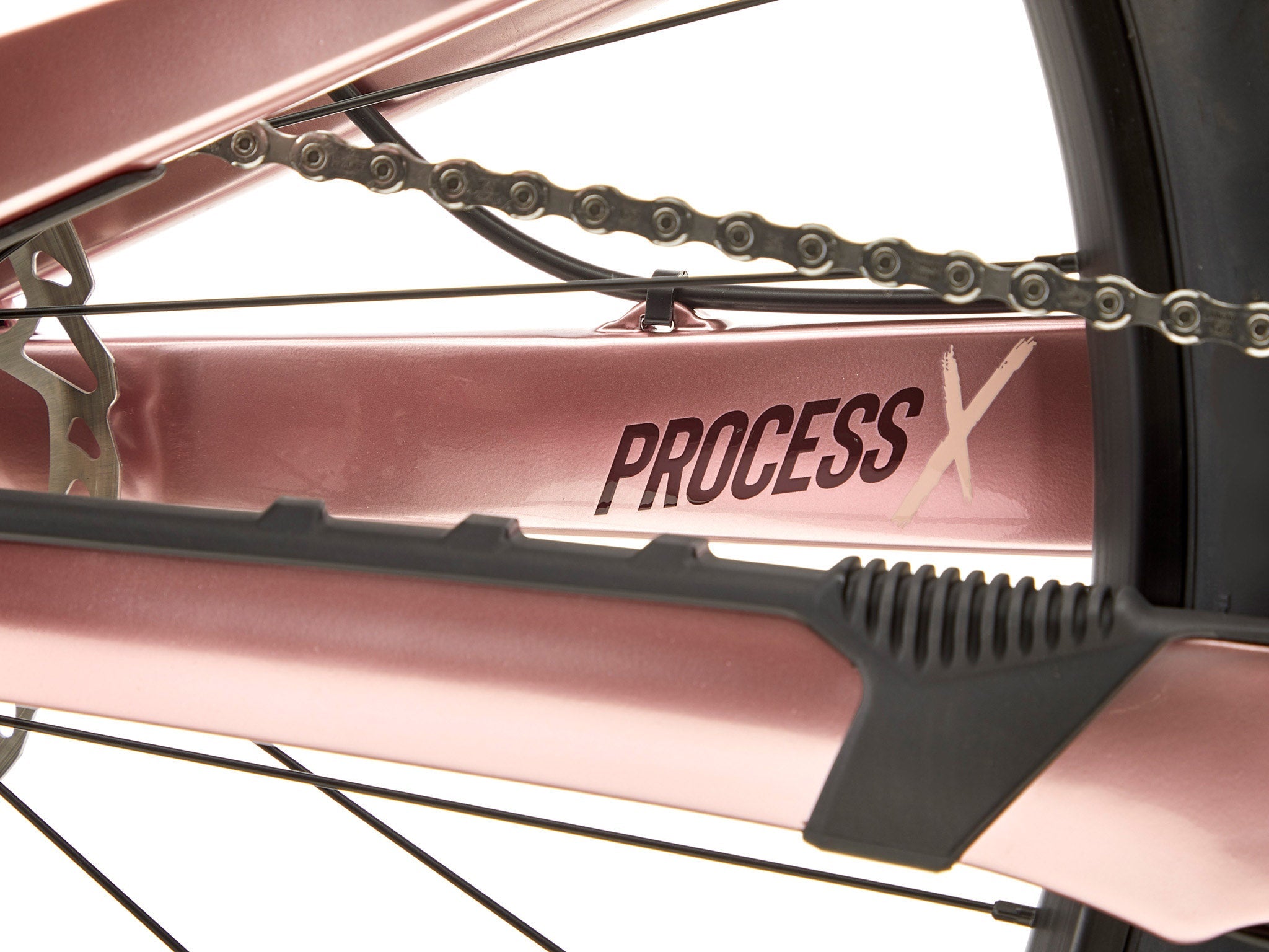 Rider descending technical trail with the Process X CR mountain bike