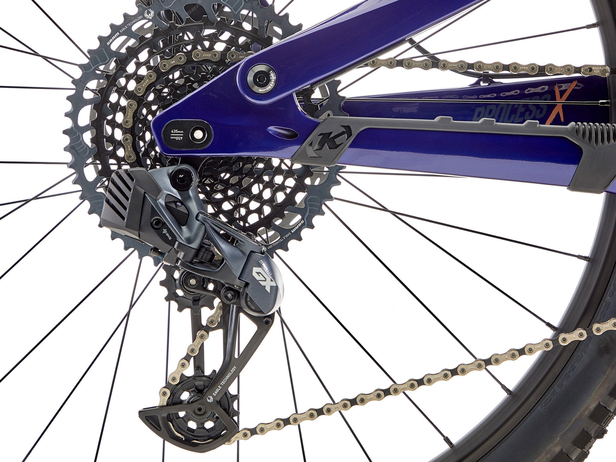 Kona Process X CR DL Carbon Mountain Bike showcasing its sleek design on a downhill trail.