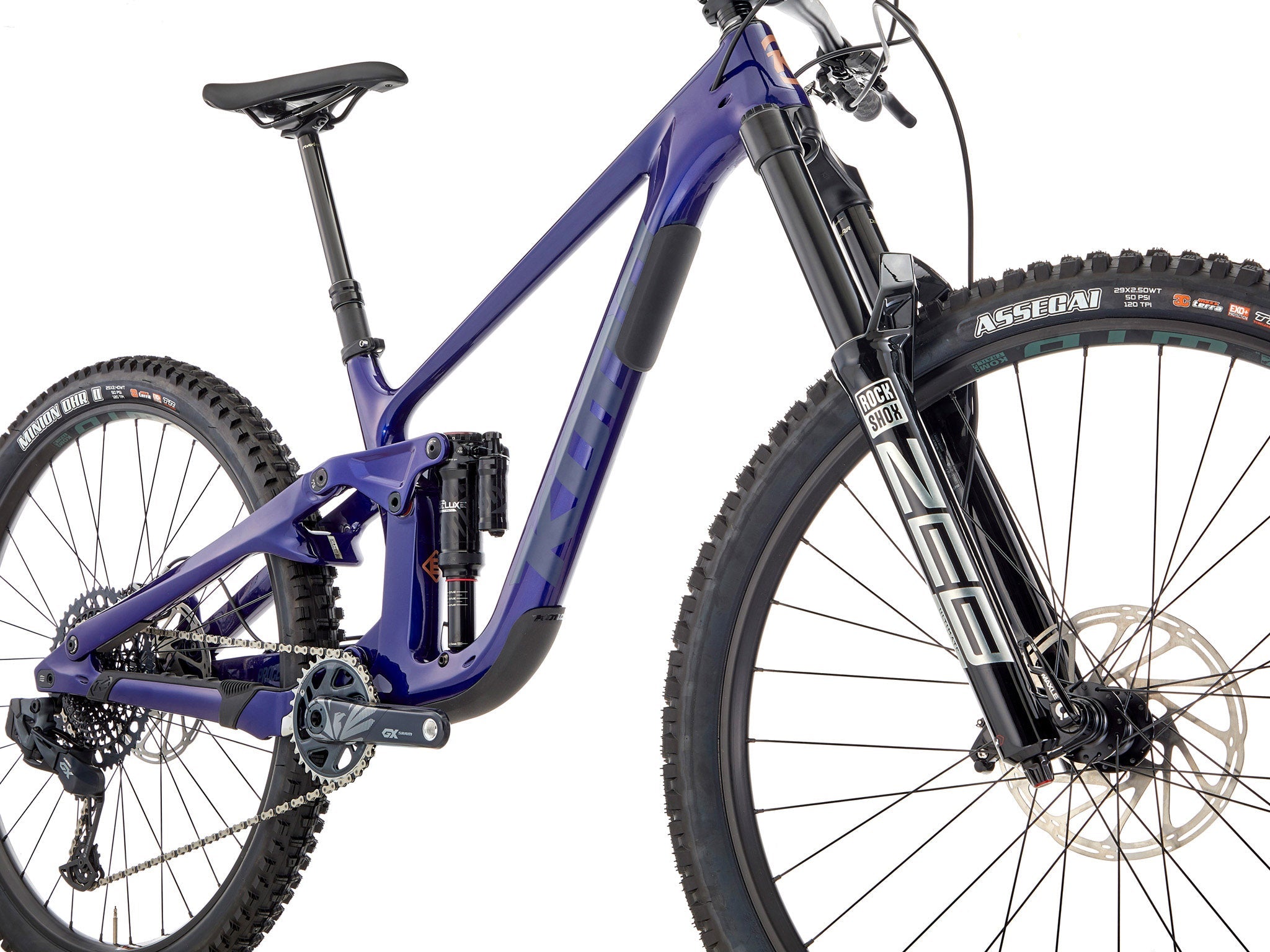 Kona Process X CR DL Carbon Mountain Bike showcasing its sleek design on a downhill trail.